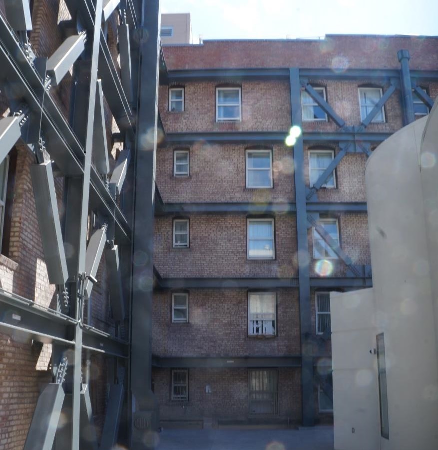 Second floor deck, view of pavilion at right, added seismic bracing 